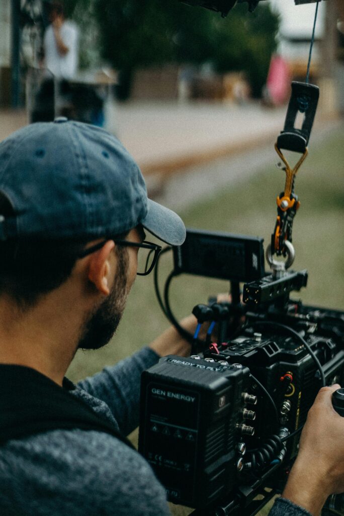 Video marketing man Holding Video Camera